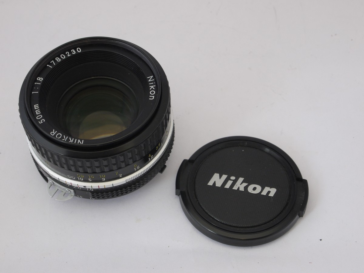mwclassiccameras-20220422-184 Nikon 50mm f1.8 Nikkor manual focus AI mount lens + makers front cap