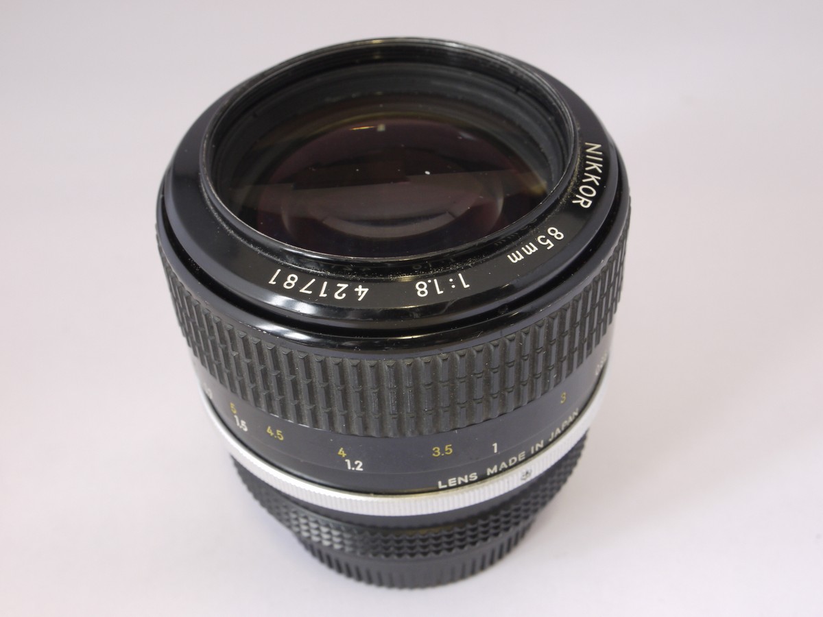 mwclassiccameras-20220429-60 Nikon 85mm f1.8 Nikkor manual focus AI mount lens + makers caps &matchig numbered box