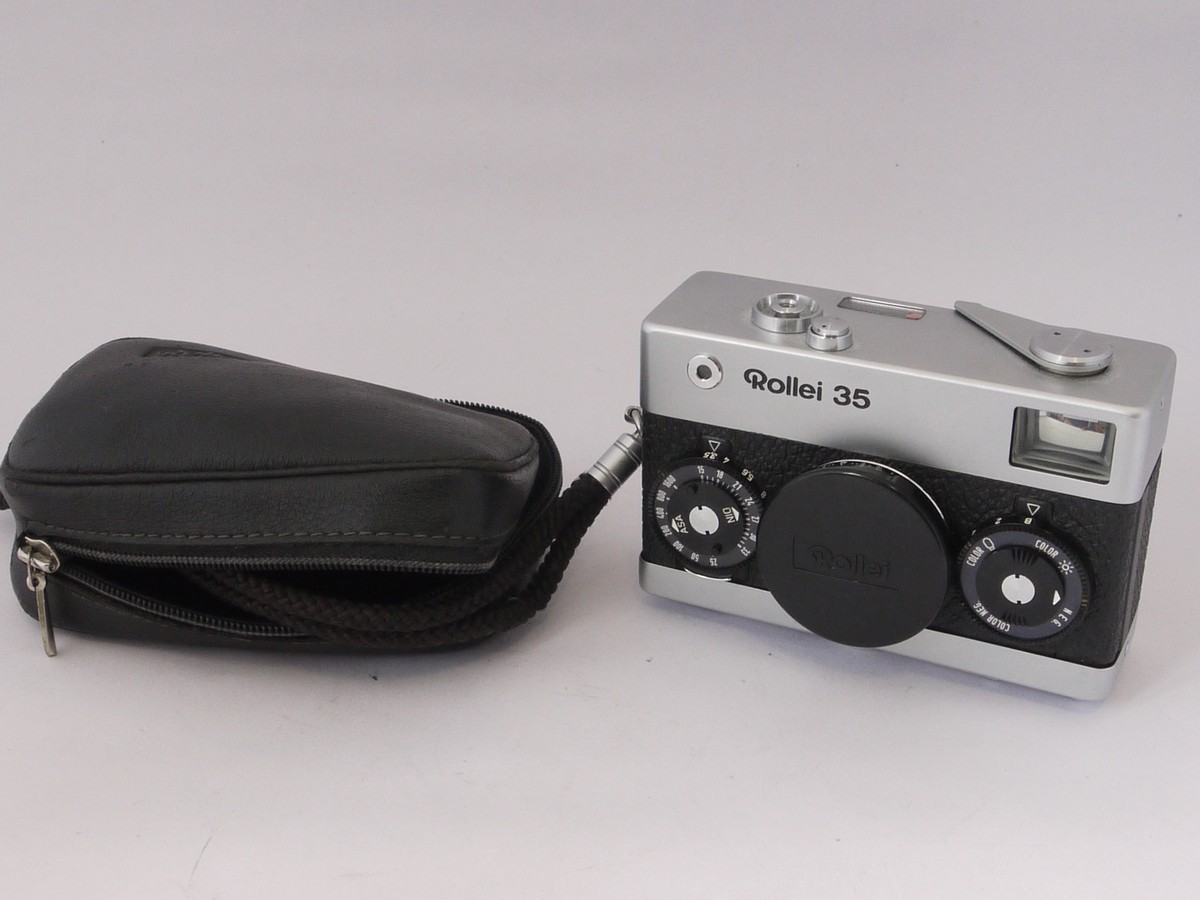 mwclassiccameras-20220513-24 Rollei 35 chrome, with 40mm f3.5 Tessar collapsible lens, with makers front cap, strap & pouch case