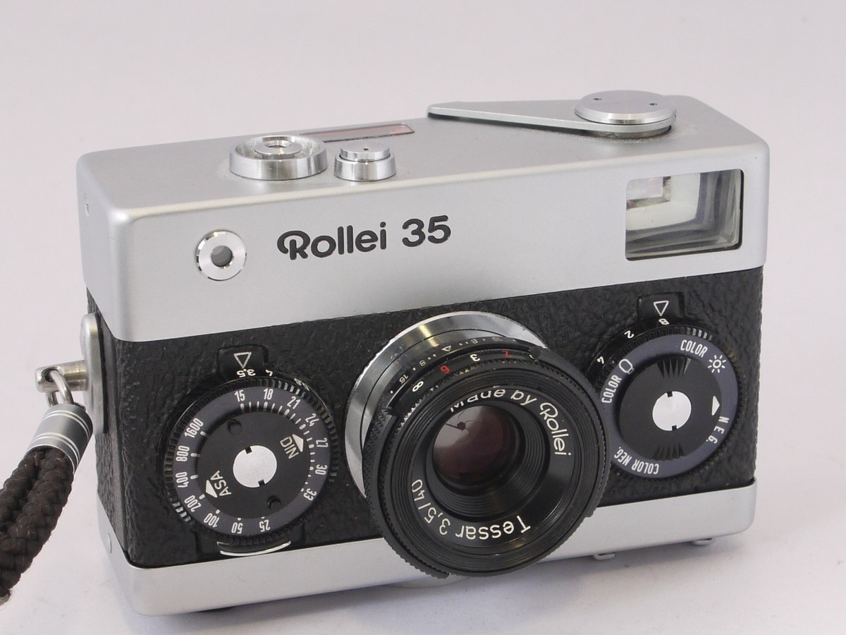 mwclassiccameras-20220513-25 Rollei 35 chrome, with 40mm f3.5 Tessar collapsible lens, with makers front cap, strap & pouch case
