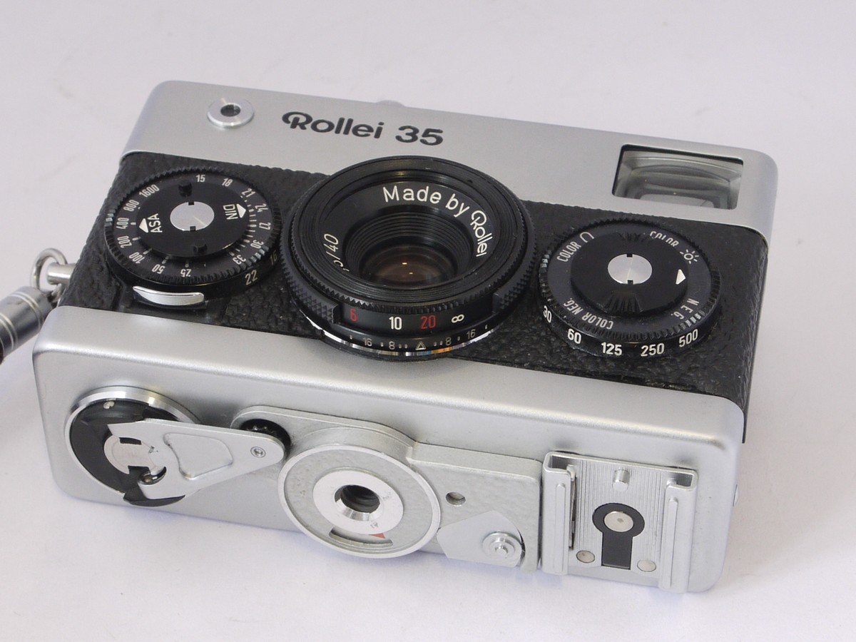 mwclassiccameras-20220513-28 Rollei 35 chrome, with 40mm f3.5 Tessar collapsible lens, with makers front cap, strap & pouch case