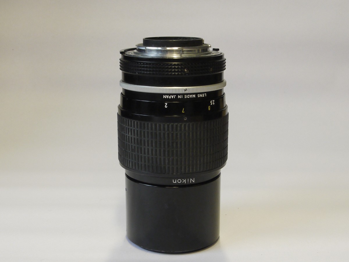 mwclassiccameras-20220520-18 Nikon 200mm f4 Nikkor manual focus AI mount lens with built-in lens hood & caps