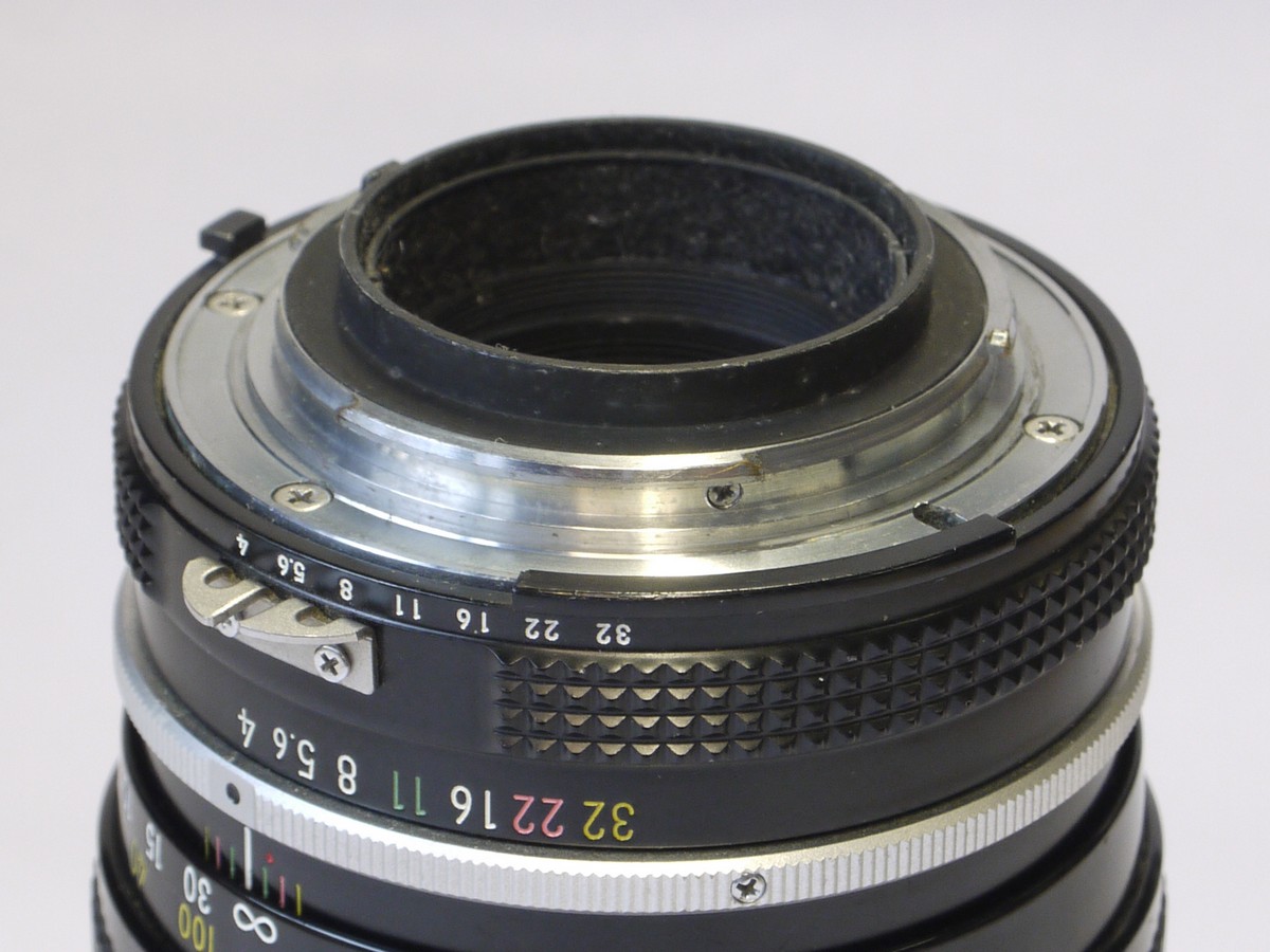 mwclassiccameras-20220520-19 Nikon 200mm f4 Nikkor manual focus AI mount lens with built-in lens hood & caps