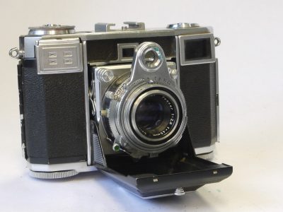 Zeiss Ikon Contessa 35 533/24 35mm folding selenium metered coupled rangefinder camera with Zeiss Opton 45mm f2.8 Tessar coated lens in Synchro Compur shutter + makers ER case