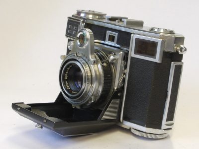 Zeiss Ikon Contessa 35 533/24 35mm folding selenium metered coupled rangefinder camera with Zeiss Opton 45mm f2.8 Tessar coated lens in Synchro Compur shutter + makers ER case