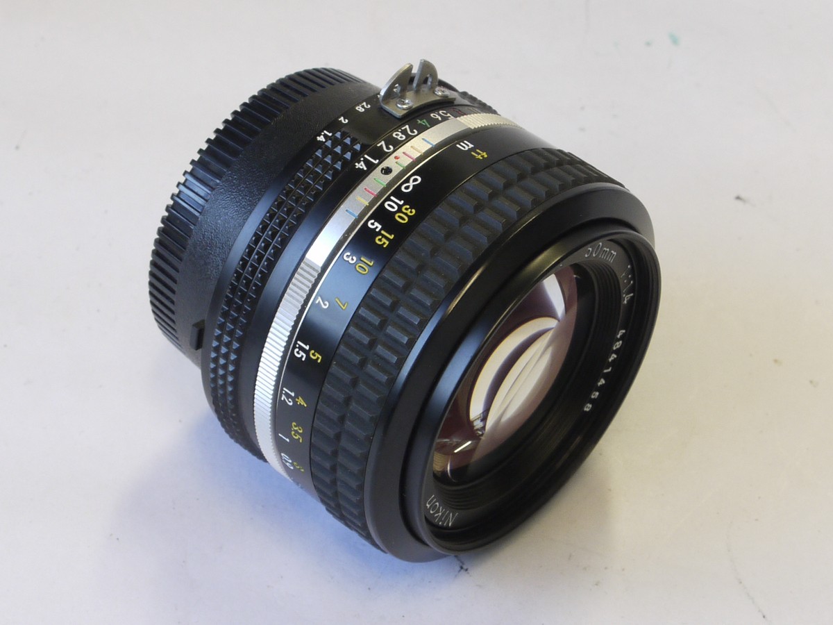 mwclassiccameras-20220527-355 Nikon 50mm f1.4 Nikkor manual focus AI mount lens + makers caps