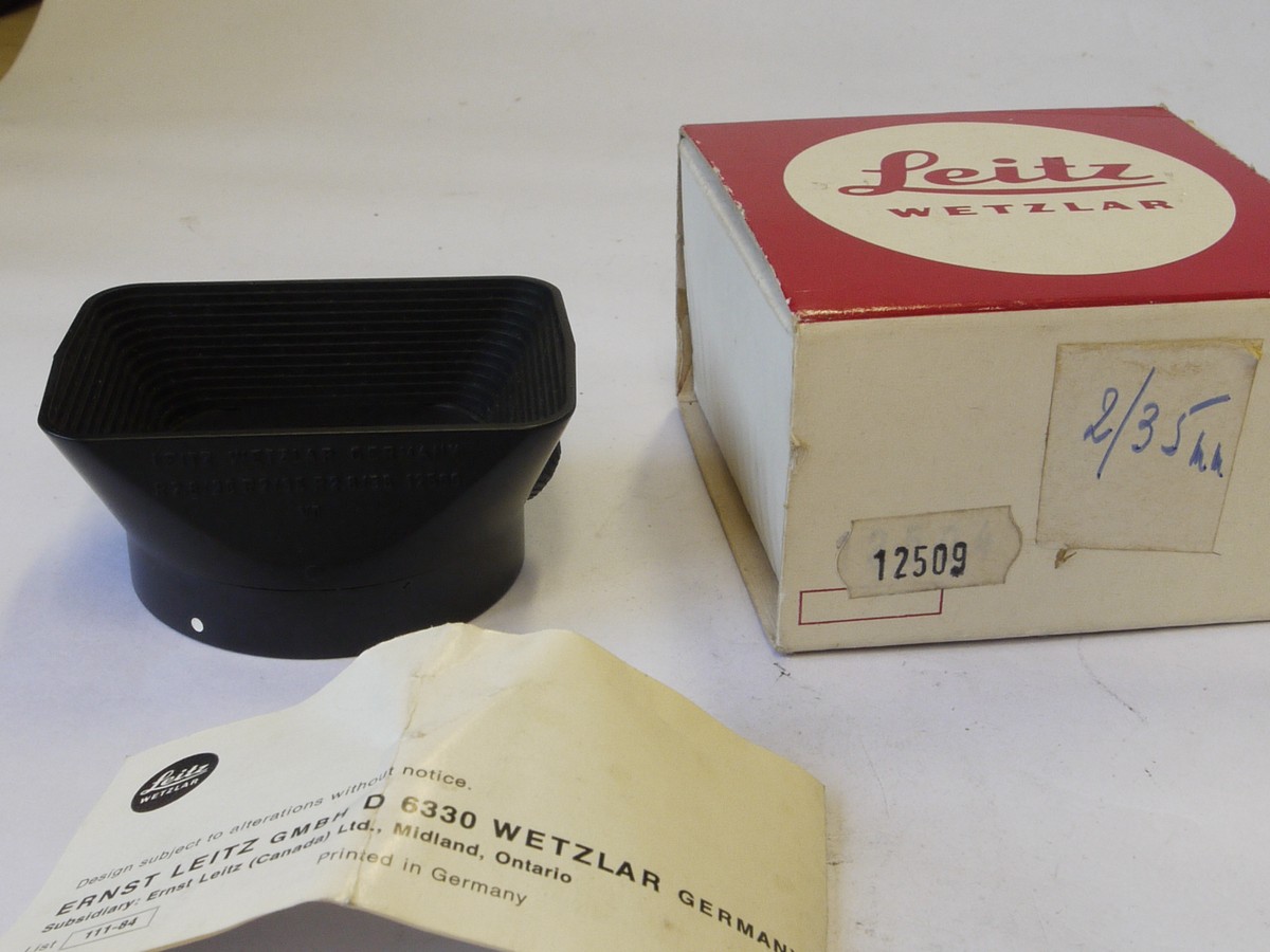 mwclassiccameras-20220527-397 Leitz bayonet fitting hard plastic square shaped lens hood for 28/2.8, 35/2 & 35.2.8 R lenses (12509) + makers instructions & Box