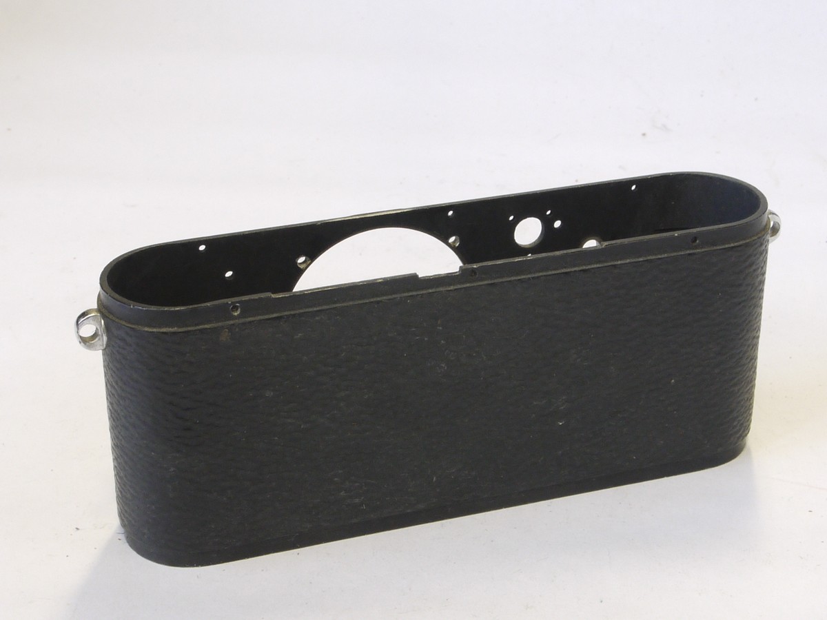 mwclassiccameras-20220610-368 Leitz Spare parts - Leica III/IIIa/IIIb body shell with vulcanite covering & 2 added front body flash sockets + Glass elements for the 50mm f3.5 Elmar nickel lens & the inner barrel & front face with some inner parts & with tIris Diaphragm