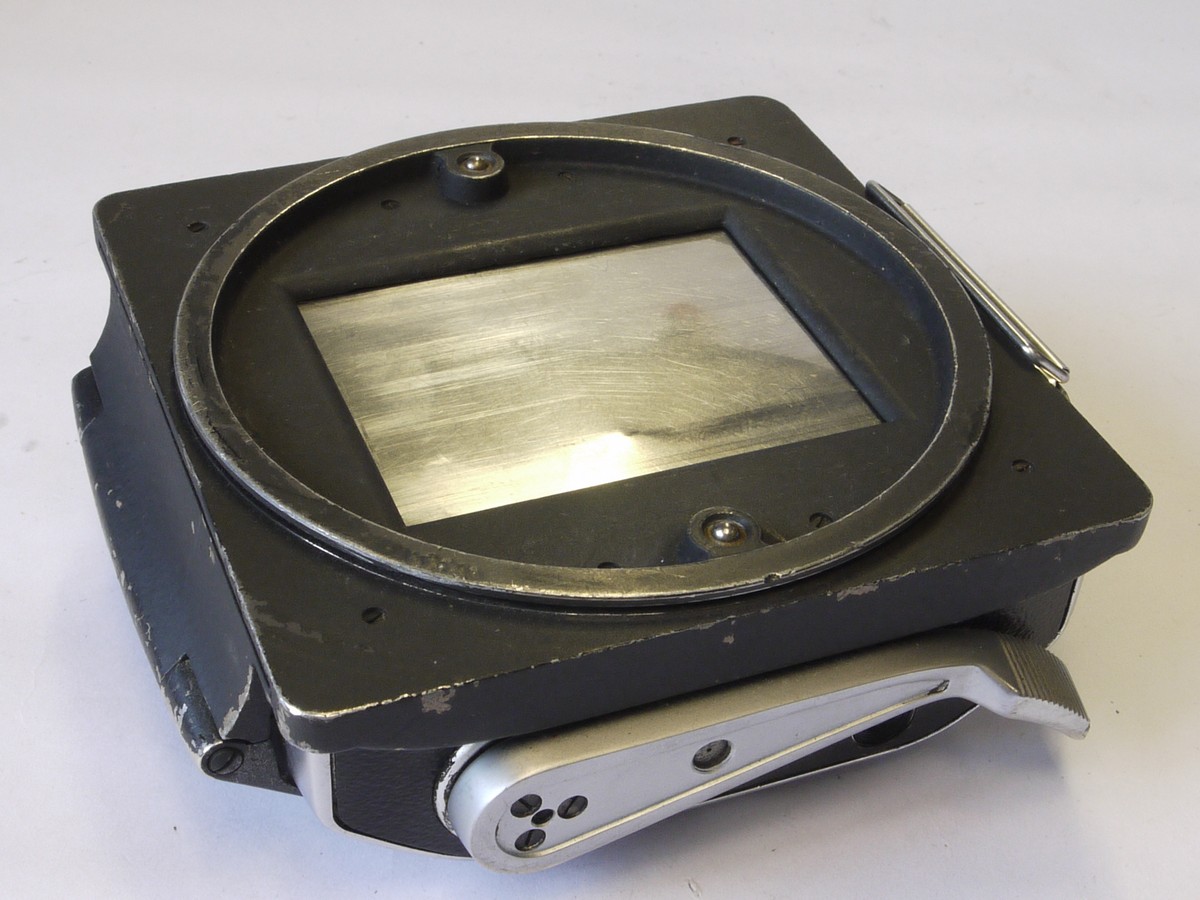 mwclassiccameras-20220617-229 Linhof 6x7 Rotating Rollfilm Back, black covering, with Dark slide. Logo on back
