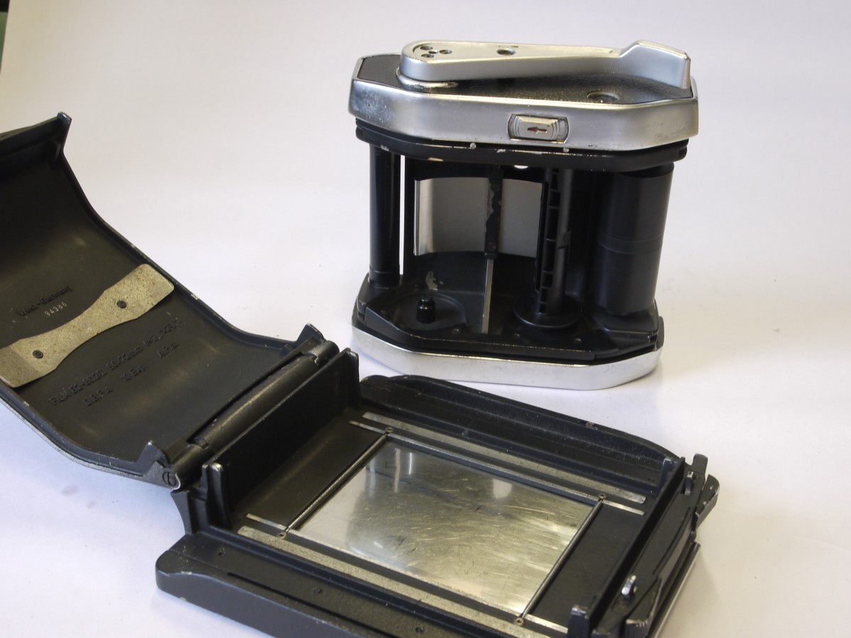 mwclassiccameras-20220617-231 Linhof 6x7 Rotating Rollfilm Back, black covering, with Dark slide. Logo on back