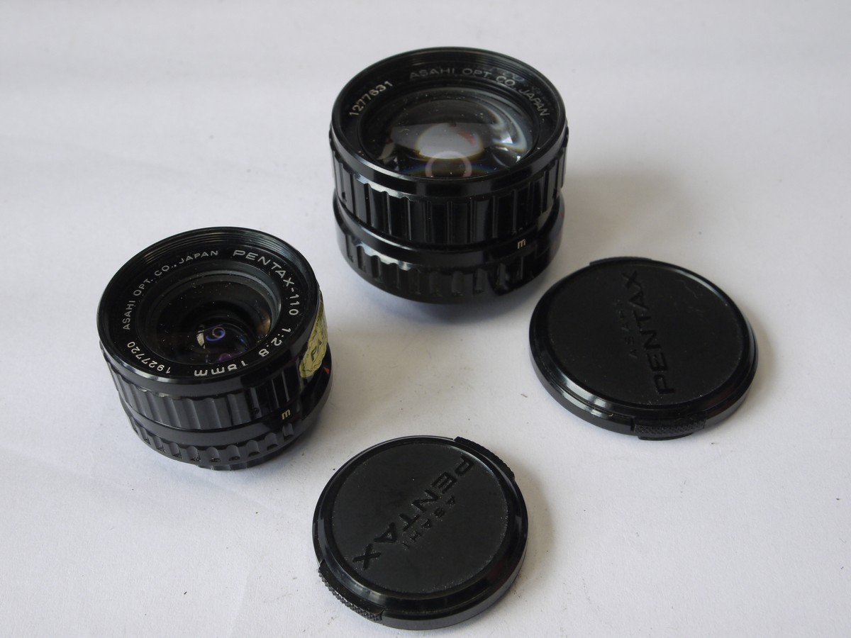 mwclassiccameras-20220729-226 Pentax Auto 110 camera with 24mm f2.8, 18mm f2.8 & 50mm f2.8 interchangeabe lenses (with caps) AF130P flash & makers outfit box