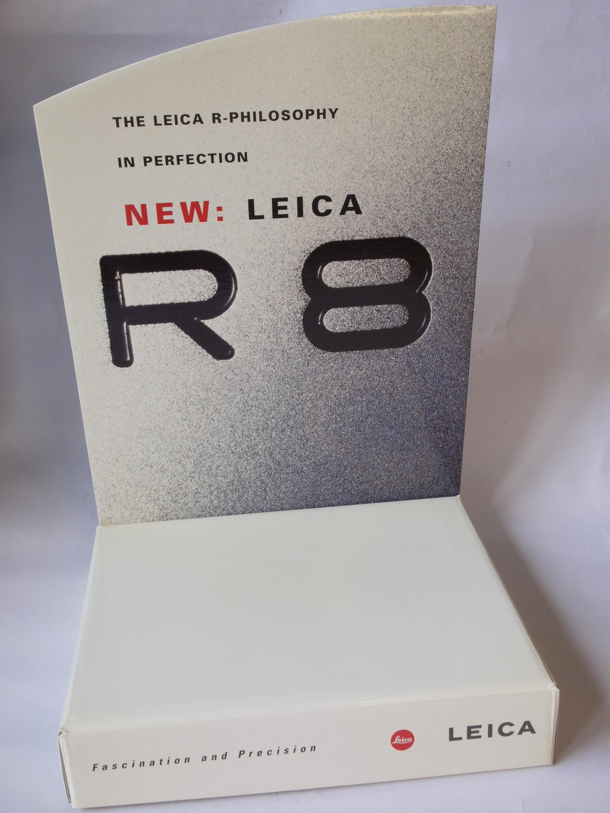 mwclassiccameras-20220805-200 Leica "New: LEICA R8" card table top display stand with built-in rear stand (293x210x10mm) With 2 x Stickers, instructions & Box packaging