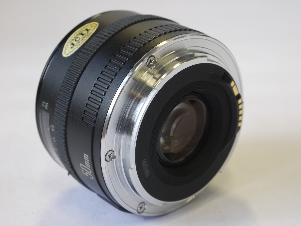 mwclassiccameras-20220819-25 Canon EF 50mm f1.8 Lens + makers caps & independent made DC-S 52mm screw-in lens hood