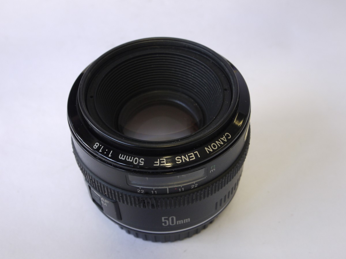 mwclassiccameras-20220819-26 Canon EF 50mm f1.8 Lens + makers caps & independent made DC-S 52mm screw-in lens hood