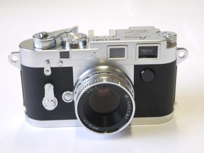 Minox Leica M3 camera (No.M3-E13341) + Minox Minocolor 100ASA unused film in box + wooden outfit box