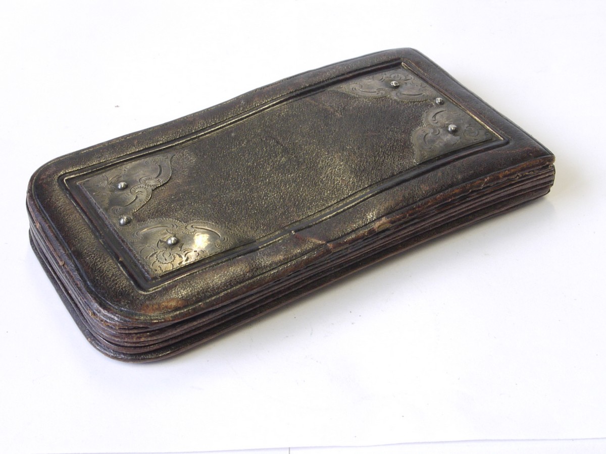 mwclassiccameras-20220923-185 Antique Brown leather concertina collapsing plate holder wallet (5 plates) with decorative patterned metal attachments (145 x 75mm)