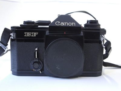 Canon EF 35mm Black SLR body + Canon body cap & neck strap