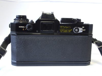 Canon EF 35mm Black SLR body + Canon body cap & neck strap