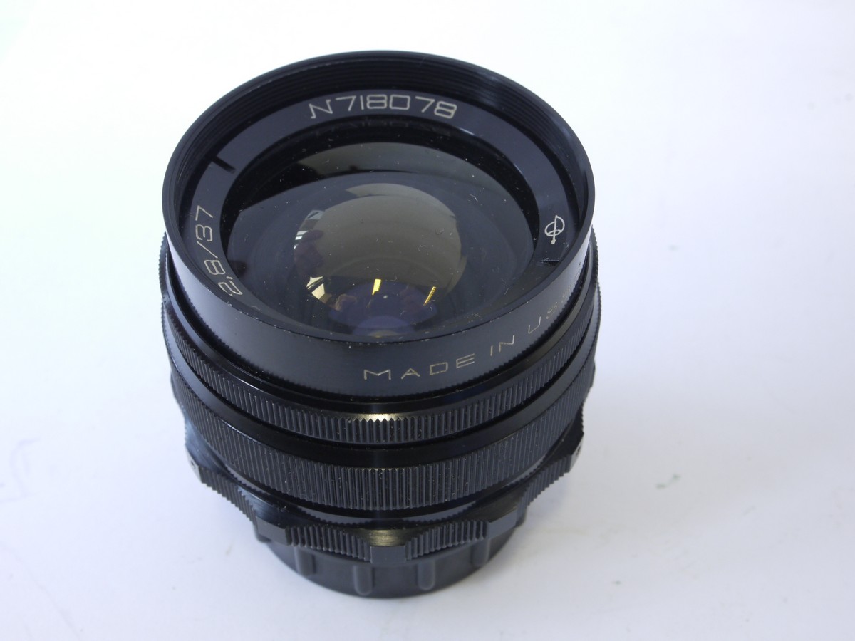 mwclassiccameras-20220923-242 USSR made 37mm f2.8 MIR-1 all black manual focus M42 screw mout lens + makers rear cap & keeper case