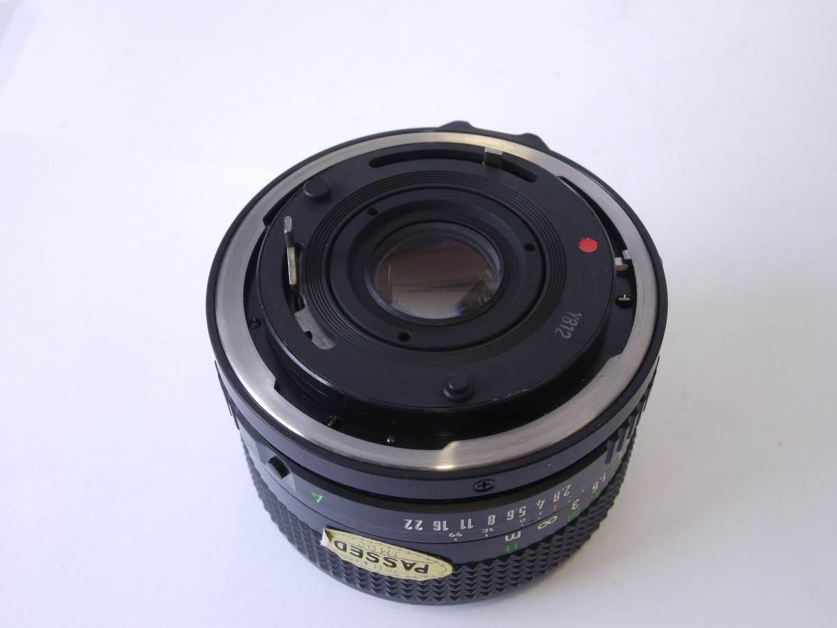 mwclassiccameras-20220930-142 Canon 28mm f2.8 manual focus FD mount lens + makers caps, inspection card, booklet & box with packaging