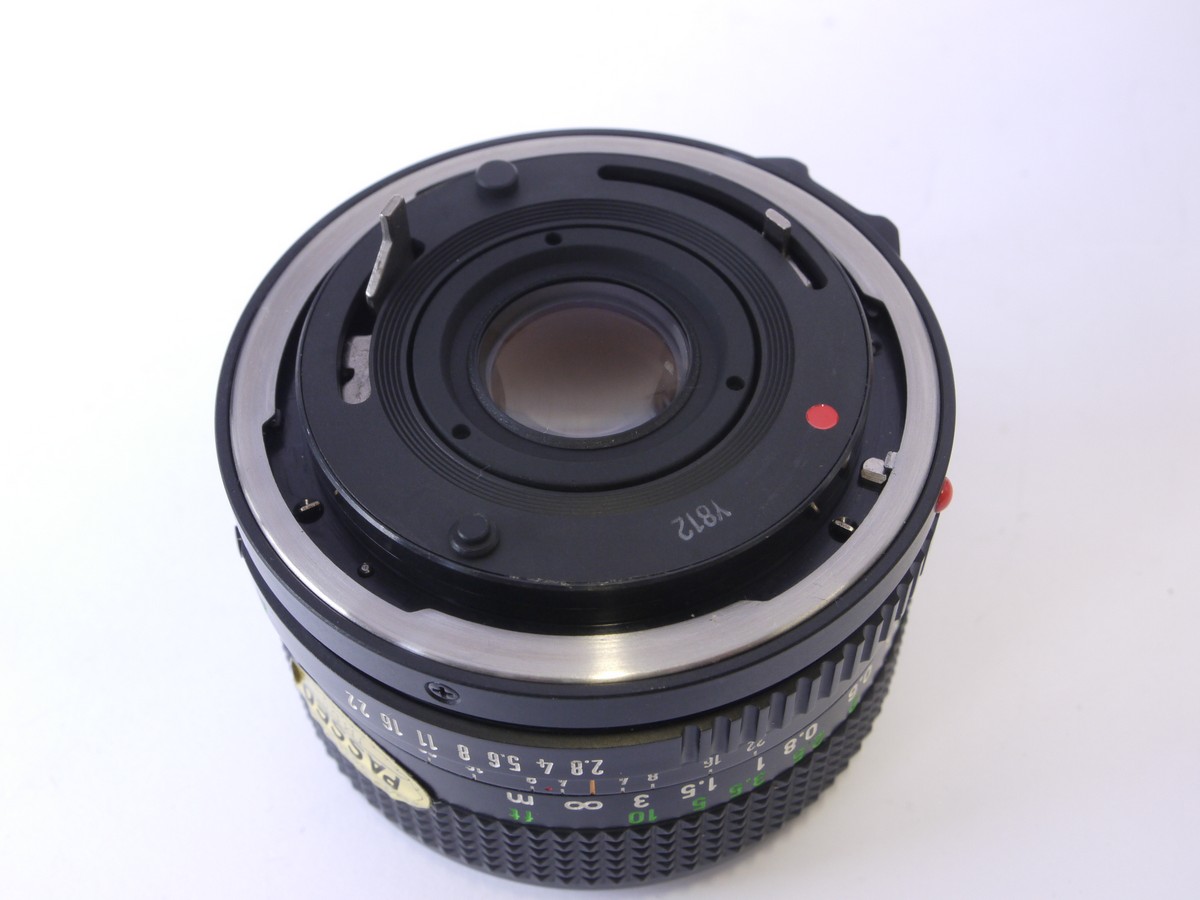 mwclassiccameras-20220930-145 Canon 28mm f2.8 manual focus FD mount lens + makers caps, inspection card, booklet & box with packaging