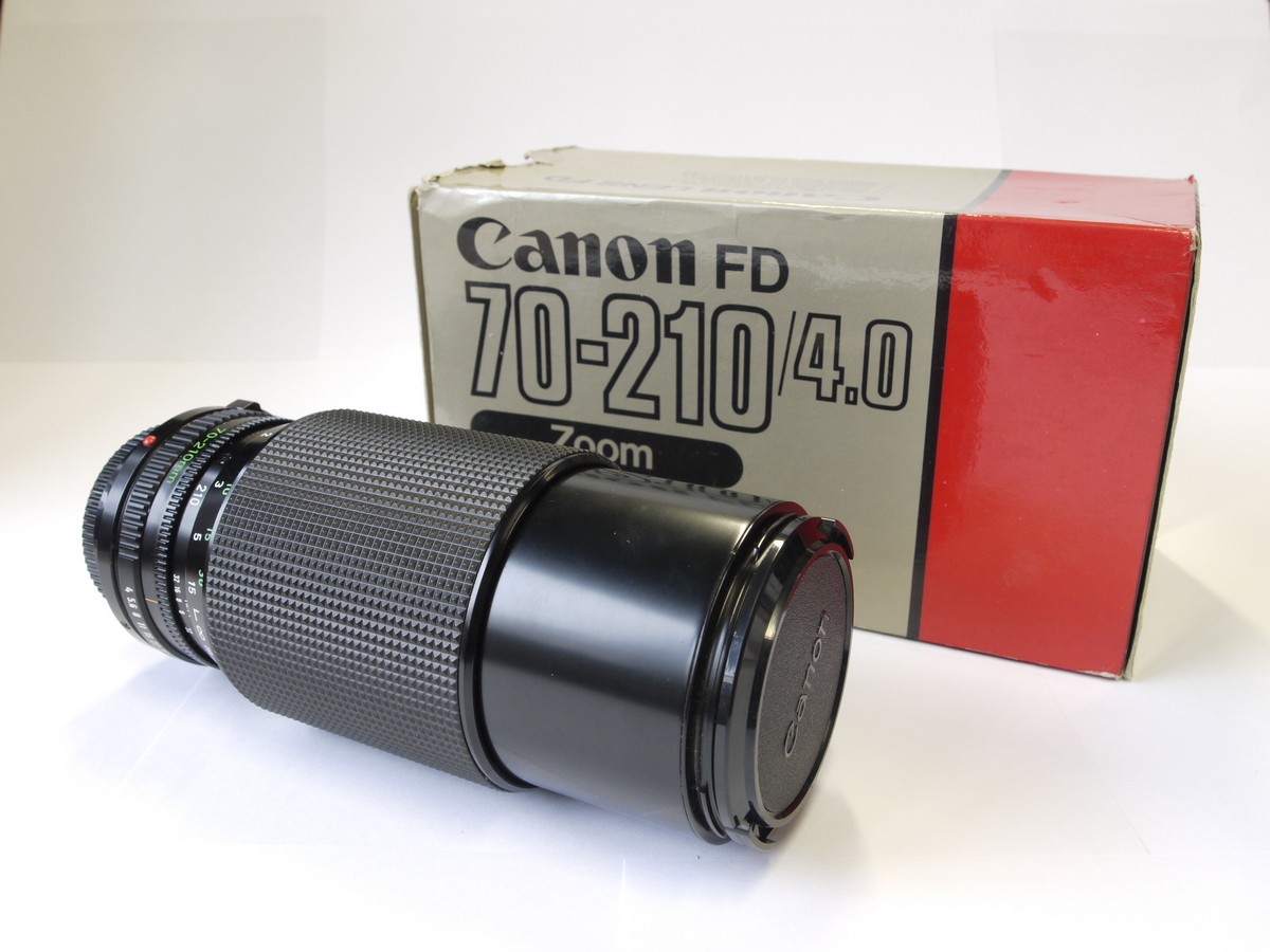 mwclassiccameras-20221118-1 Canon 70-210mm f4 manual zoom/focus FD mouont lens + makers caps & box with packaging