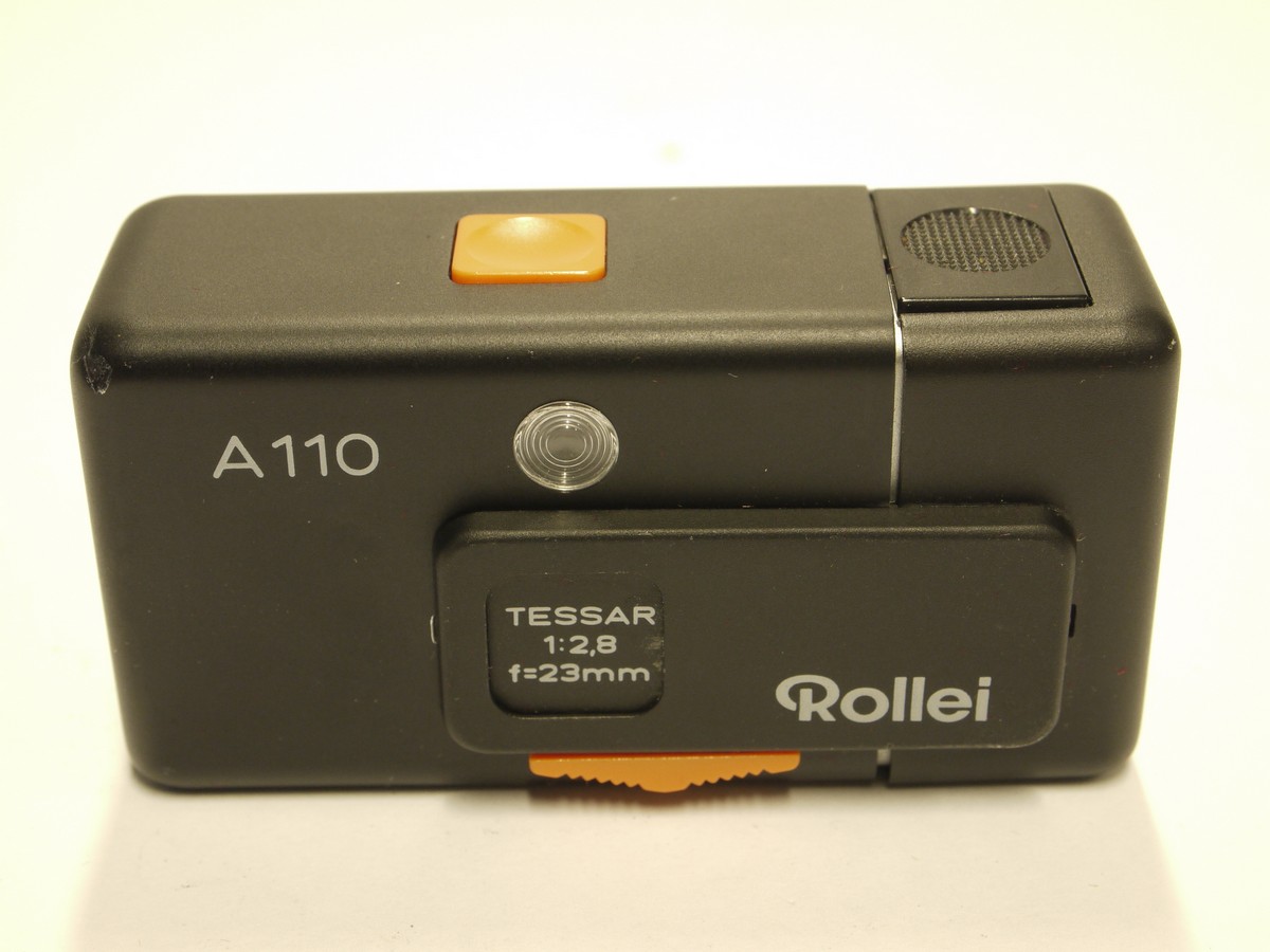 mwclassiccameras-20221118-304 Rollei A110 Subminiature camera with 23mm f2.8 Tessar lens, Chain strap, Warranty papers, leatherette case & presentation case