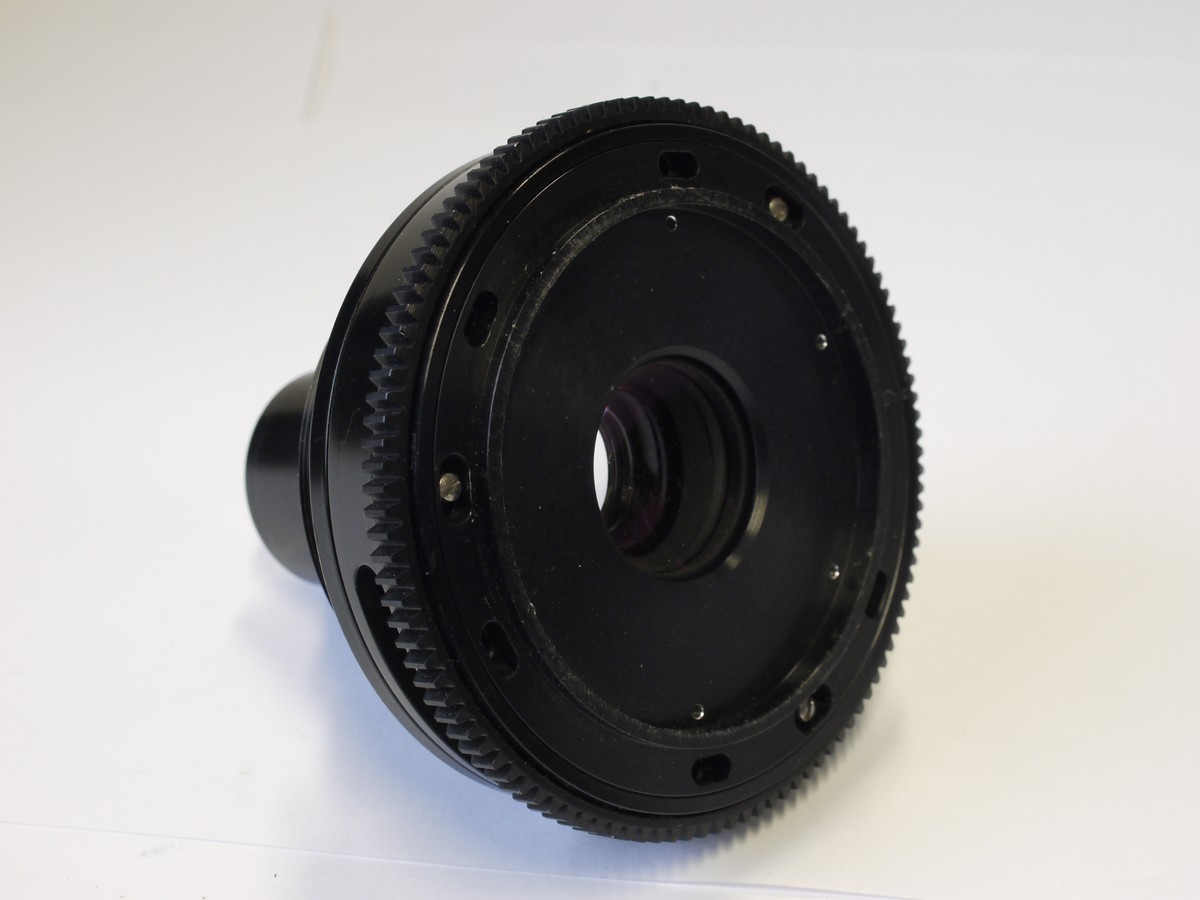 mwclassiccameras-20230106-33 British Cine lens with no mount, no Iris Diaphragm, only a rotating ring. Approximately 50-70mm focal length. Glass diameter is 25mm. Front to rear glass surface is . Possibly a Taylor Hobson Cooke cine lens (has similar styling)