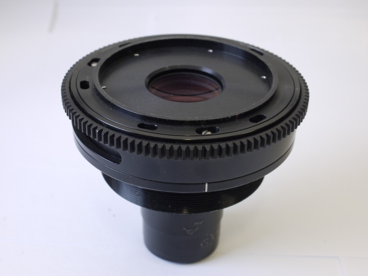 mwclassiccameras-20230106-35 British Cine lens with no mount, no Iris Diaphragm, only a rotating ring. Approximately 50-70mm focal length. Glass diameter is 25mm. Front to rear glass surface is . Possibly a Taylor Hobson Cooke cine lens (has similar styling)