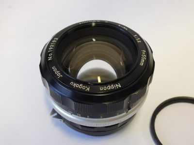 Nippon Kogaku Nikon 55mm f1.2 Nikkor-S Pre AI lens with scalloped focusing ring + Nikon L1Bc clear filter & makers rear cap