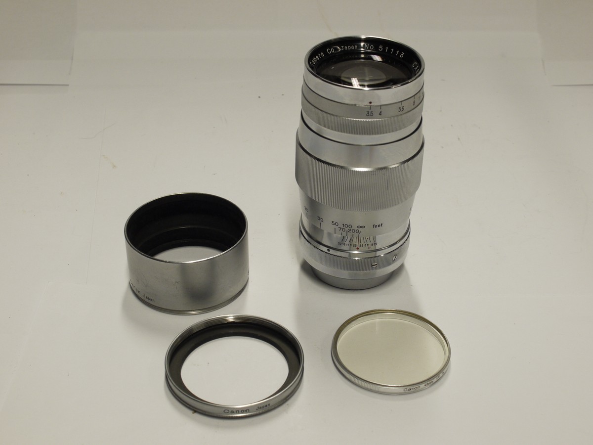 mwclassiccameras-20230113-391 Canon 135mm f3.5 All chrome lens, L39 Rangefinder coupled, with Canon 48mm UV filter, Series 7/48mm adapter ring, makers Series VII lens hood & rear cap