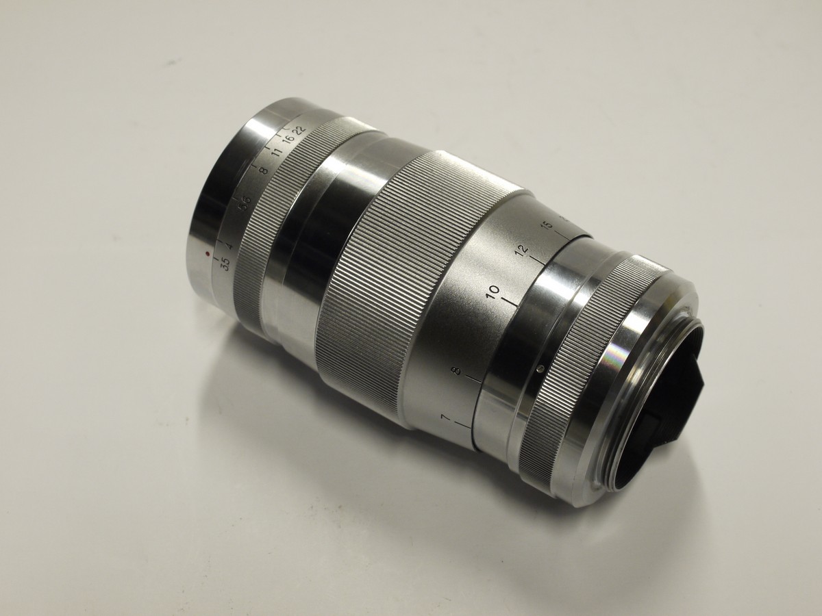 mwclassiccameras-20230113-393 Canon 135mm f3.5 All chrome lens, L39 Rangefinder coupled, with Canon 48mm UV filter, Series 7/48mm adapter ring, makers Series VII lens hood & rear cap