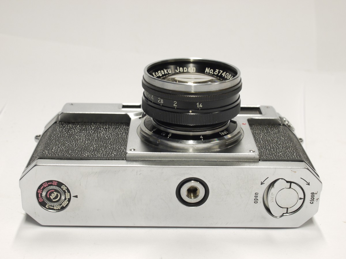 mwclassiccameras-20230120-400 Nikon S2 chrome (No.6189431), late version with black face top plate fittings + 5cm f.4 Nikkor-S.C BLACK lens with black front face (No.374094), Nikon front cap & Nikon ER case with strap