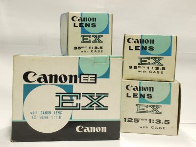 Canon EX EE QL 35mm SLR with 50mm f1.8, Canon Cable Release, instructions & Box + Canon 35mm f3.5 EX lens with caps, hood, case & box, Canon 95mm f3.5 EX lens with caps, hood & box & Canon 125mm f3.5 EX lens with caps, hood, case box