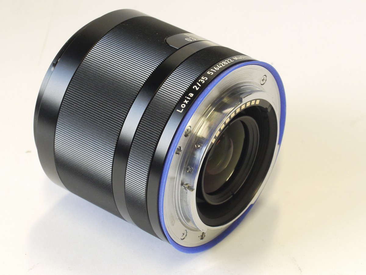 mwclassiccameras-20230203-100 Zeiss Loxia 35mm f2 Sony E mount lens with lens hood, caps, instructions & original matching numbered box with outer sleeve