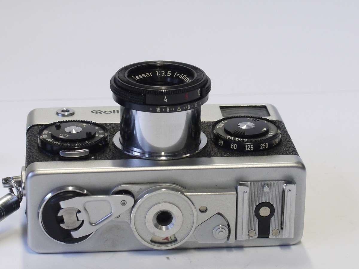 mwclassiccameras-20230217-108 Rollei 35 chrome compact camera, CDS metered, with Carl Zeiss 40mm f3.5 Tessar collapsible lens with Compur shutter + Rollei front cap, Wrist Strap & pouch case
