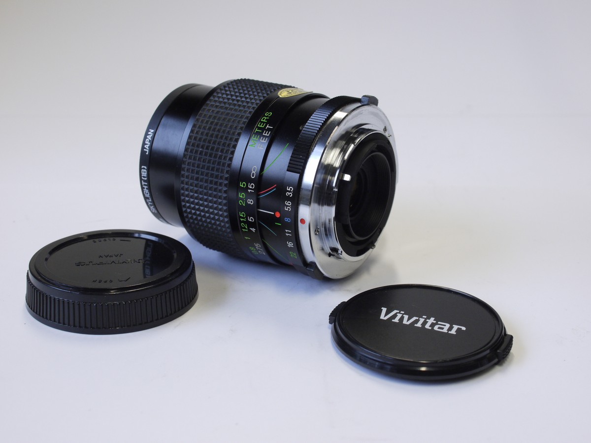 mwclassiccameras-20230217-190 Vivitar 28-70mm f3.5-4.8 lens, Olympus OM mount + Skylight filter, makers caps, instructions & box with packaging