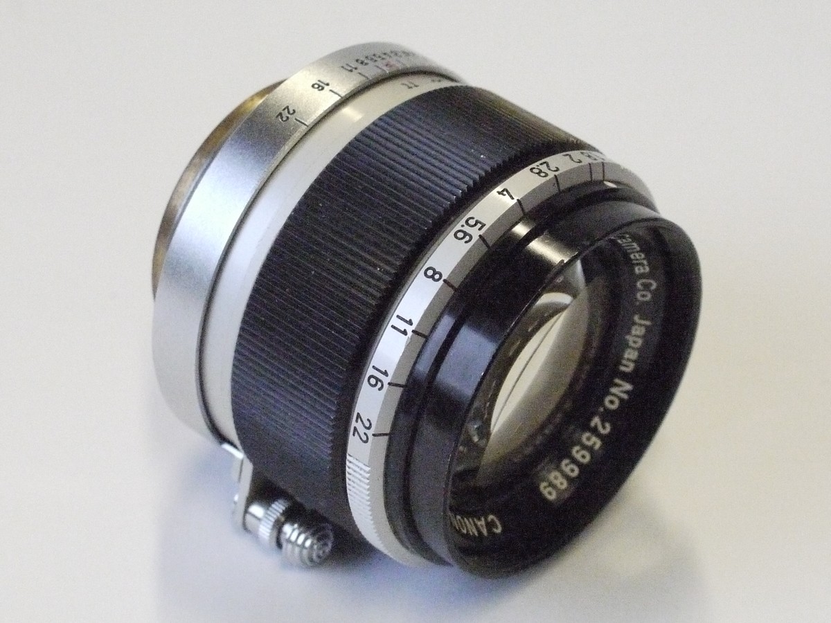 mwclassiccameras-20230303-101 Canon 50mm f1.8 black & chome Leica L39 rangefinder coupled lens + Canon caps