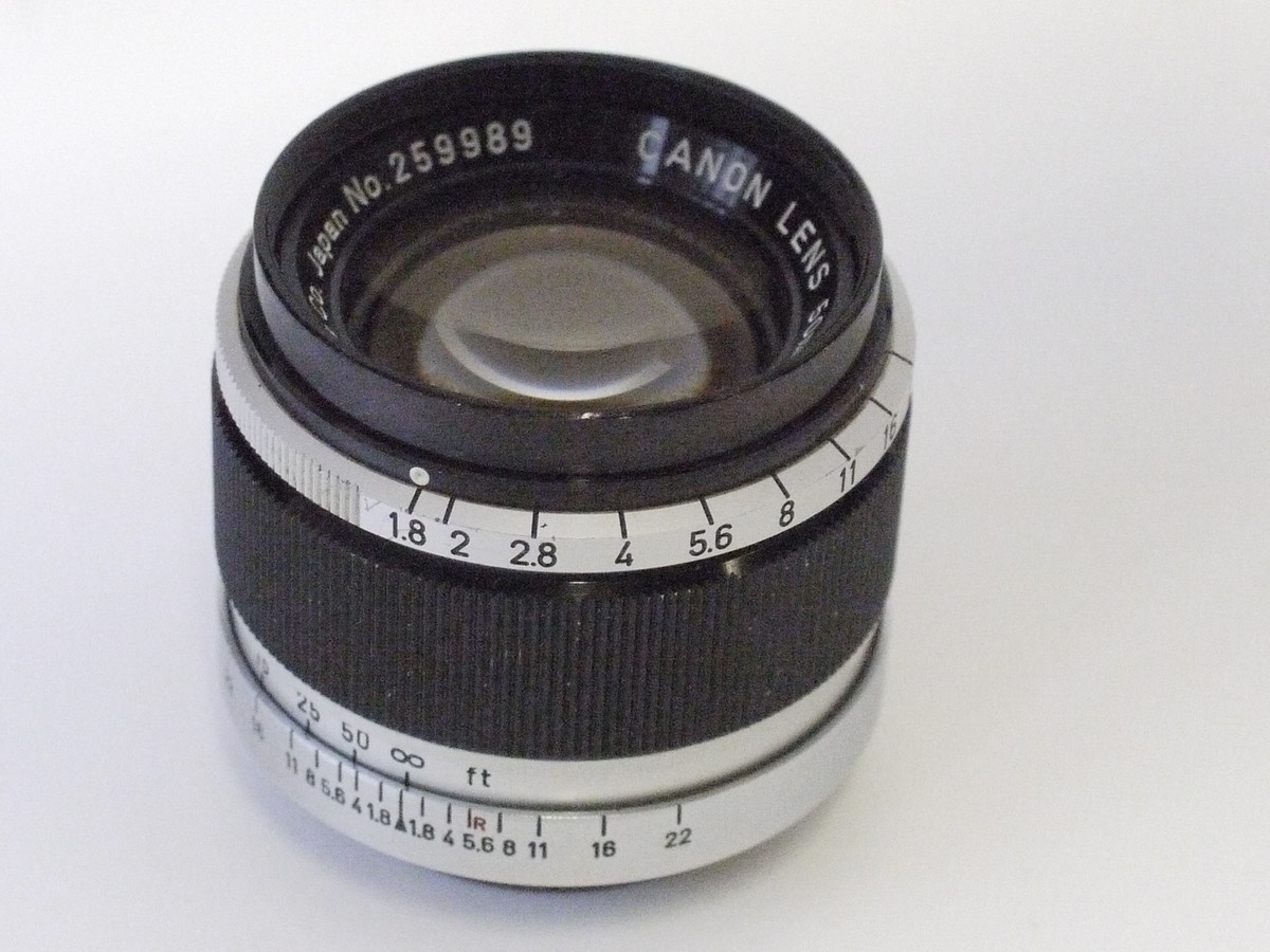 mwclassiccameras-20230303-103 Canon 50mm f1.8 black & chome Leica L39 rangefinder coupled lens + Canon caps