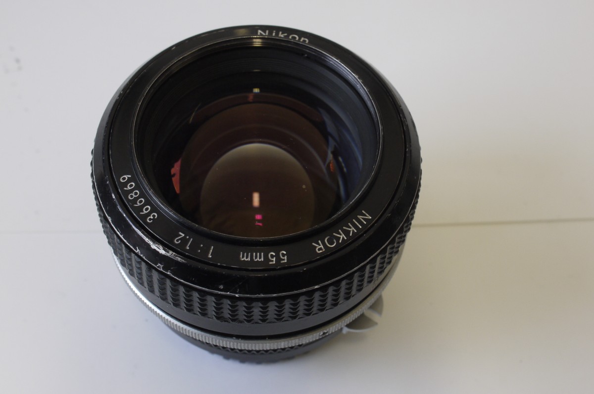 mwclassiccameras-20230331-27 Nikon 55mm f1.2 Nikkor manual focus PRE AI mount lens + Nikon caps