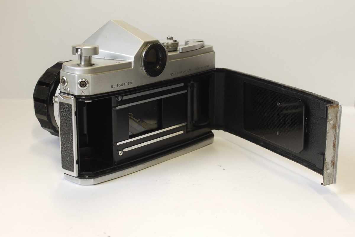mwclassiccameras-20230407-54 Ricoh Singlex 35mm SLR, chrome + 55mm f1.4 Rikenon Nikon F mount lens. Ricoh front lens cap & ER case
