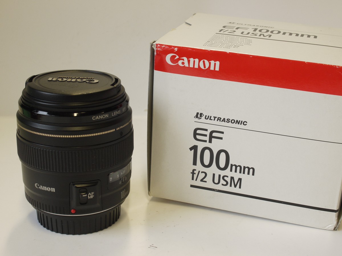 mwclassiccameras-20230414-265 Canon EF 100mm f2 USM lens + Canon caps, Instructions & makers Box with packaging