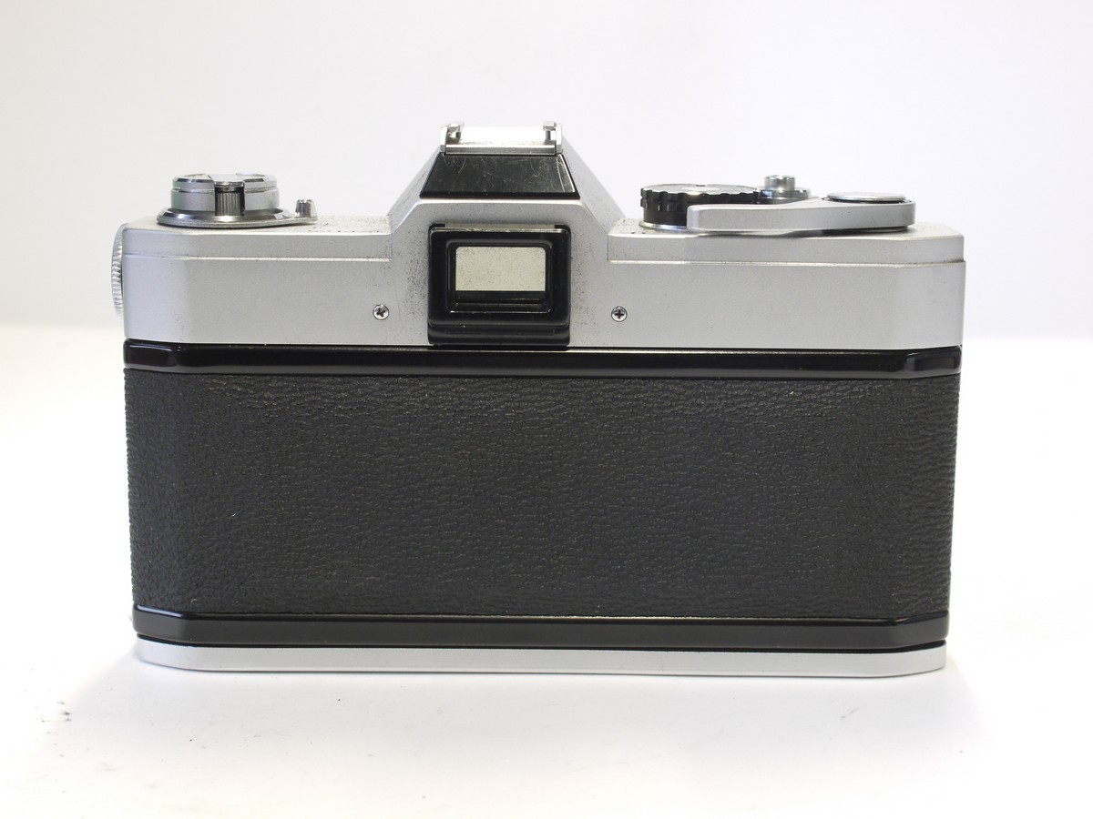 mwclassiccameras-20230414-300 Canon FT QL 35mm SLR, chrome March c1966 + Canon 50mm f1.4 FL lens, front cap, ER case, Strap, Instructions & Canon matching numbered box with packaging