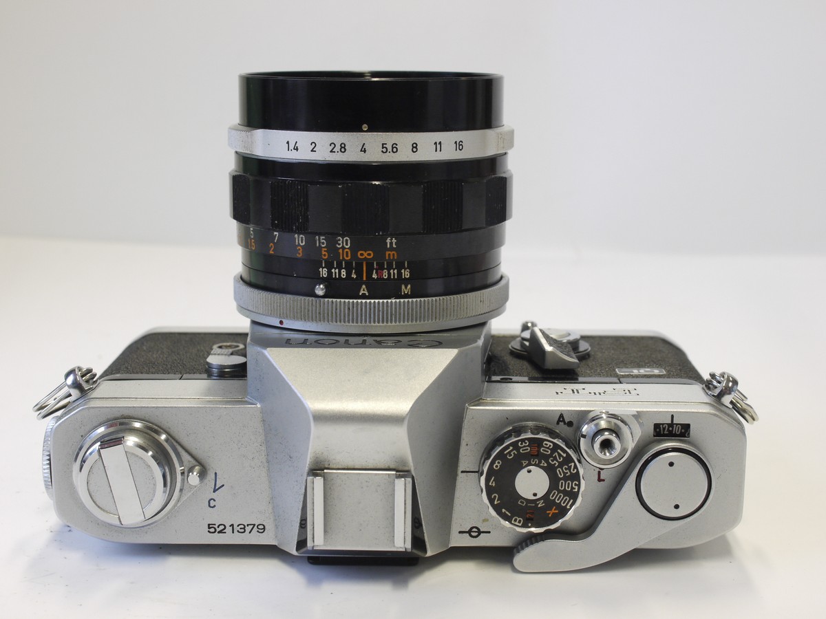 mwclassiccameras-20230414-301 Canon FT QL 35mm SLR, chrome March c1966 + Canon 50mm f1.4 FL lens, front cap, ER case, Strap, Instructions & Canon matching numbered box with packaging