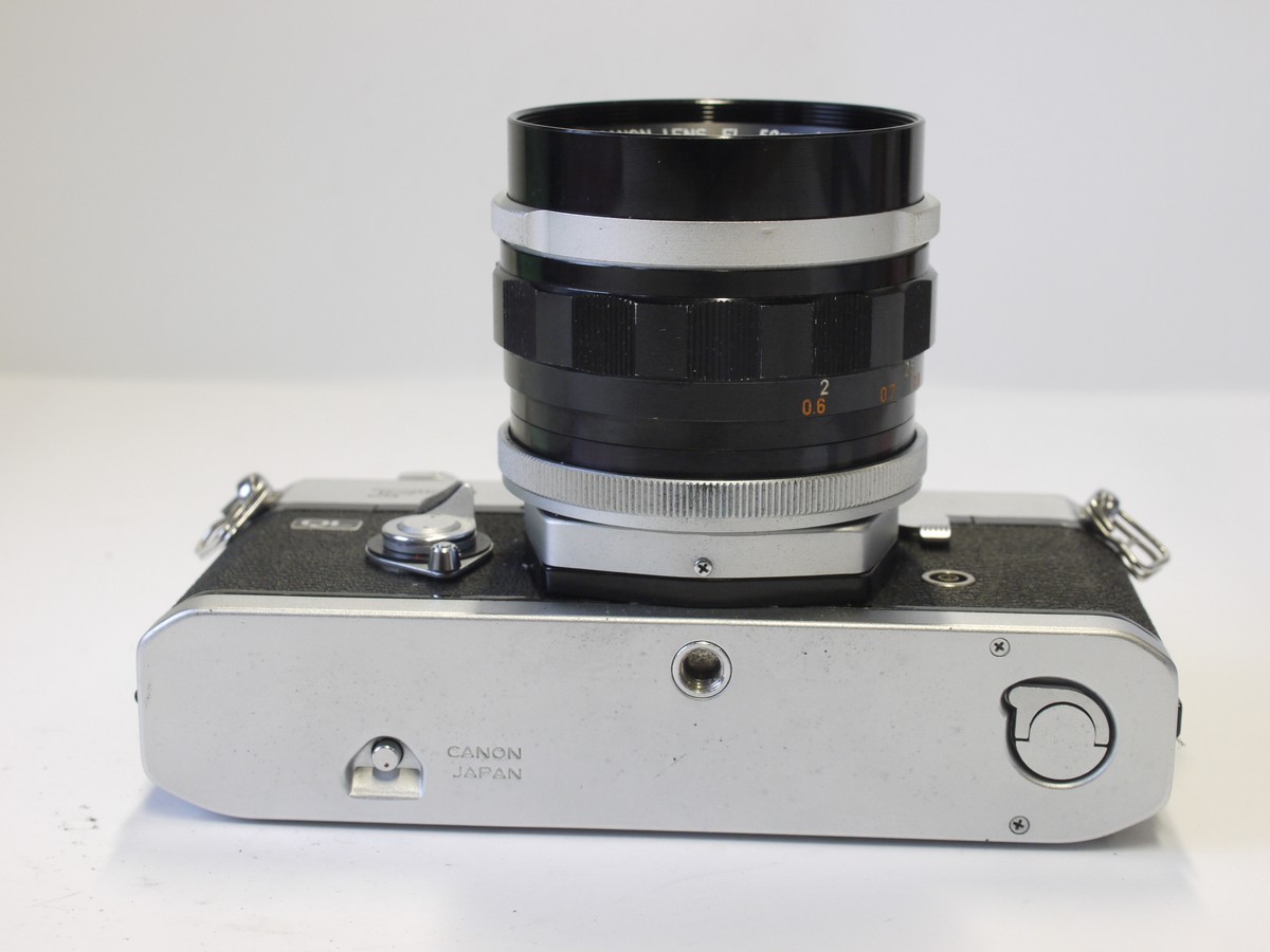 mwclassiccameras-20230414-302 Canon FT QL 35mm SLR, chrome March c1966 + Canon 50mm f1.4 FL lens, front cap, ER case, Strap, Instructions & Canon matching numbered box with packaging