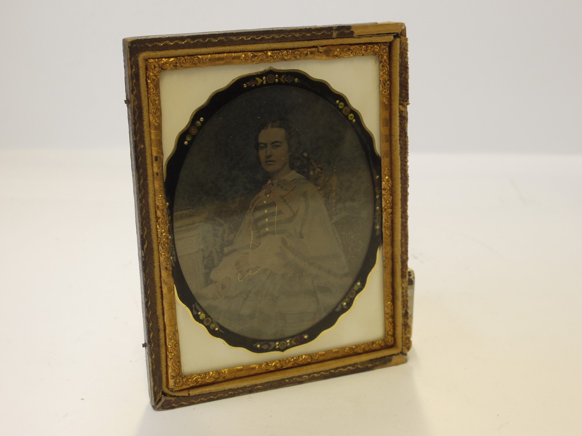 mwclassiccameras-20230420-69 Ambrotype, 1/4 plate Image of a seated Lady, tinted, with Oval frame & Square case