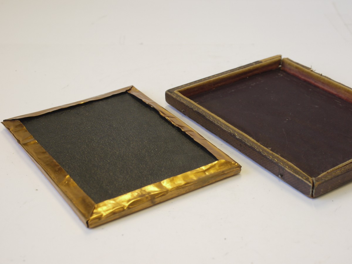 mwclassiccameras-20230420-71 Ambrotype, 1/4 plate Image of a seated Lady, tinted, with Oval frame & Square case