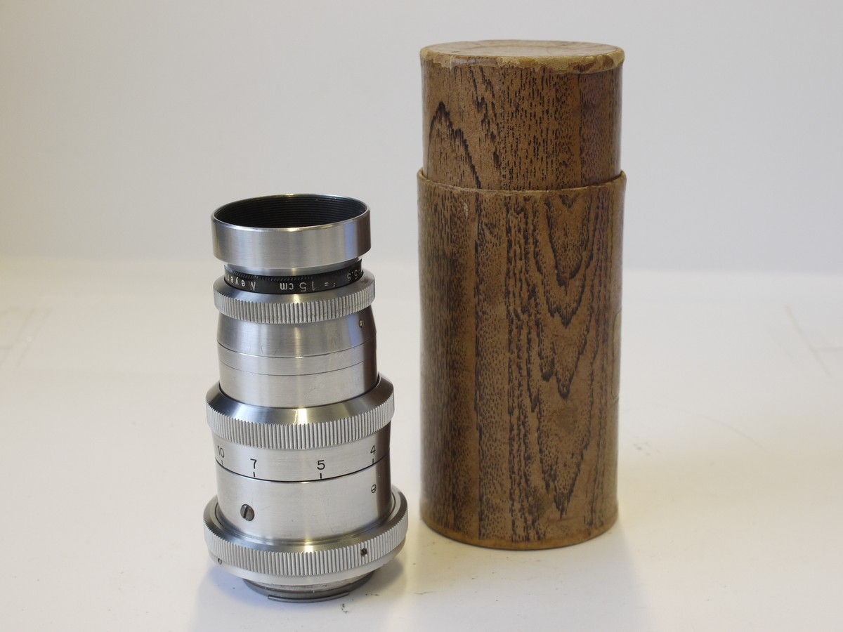 mwclassiccameras-20230420-74 Meyer Gorlitz 15cm f3.5 Tele Megor all chrome manual focus Exakta mount lens, with makers lens hood & Zeiss 2-part brown lens case. Heavy metal, early period lens