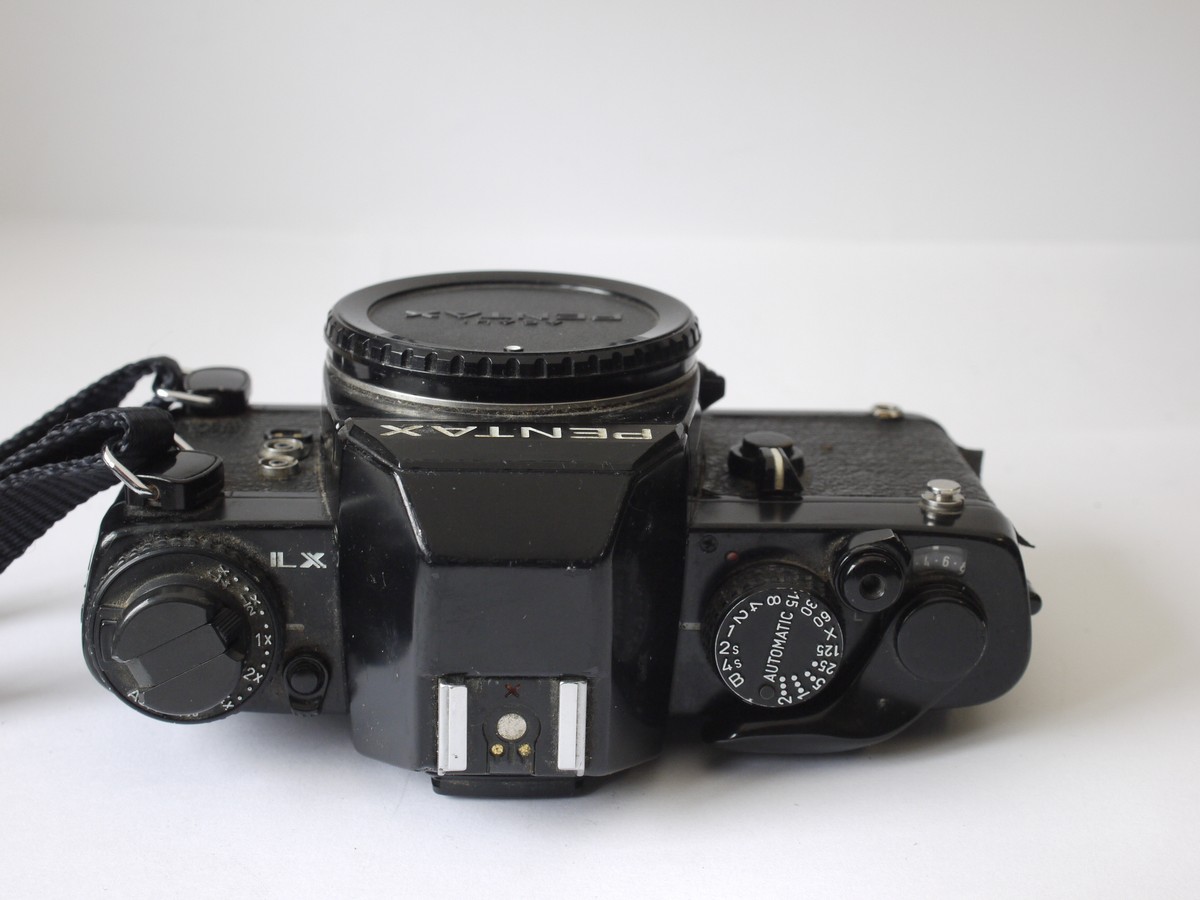 mwclassiccameras-20230428-79 Pentax LX 35mm SLR with FA-1 Prism finder, body cap & shoulder strap