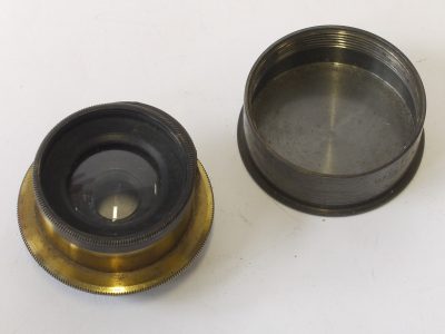 W Banks, Bolton 4 inch (Estimated) f11 brass lens with rotating wheel apertures + brass rear cap